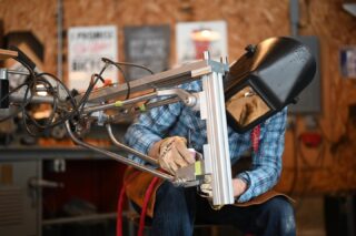 HOT SEAT //
-
Got the swing arm and lower shock mount tacked today.  You probably can’t see it but I’m not happy with those seat stay bends.. I’m going to break those tacks, and rotate the brake mount forward a tad more to give the caliper more clearance and that will allow me to get that look I’m after for seatstay to top tube visuals.  Esoteric designer not satisfied type stuff…
-
#steelfullsuspension 
#snakedriver